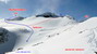 Severná strana masívu Nyheitinden s vyznačenou líniou zjazdu z hlavného (JV) vrcholu Nyheitindu na ľadovec (S1+, E2, hore 30 m cca 40°, nižšie do 30°, možnosť pokračovať ďalej muldou a dolinou k Eikesdalsvatnet, my sme z ľadovca vyšlapali (červené bodky) do sedla medzi JV a SZ vrcholom a lyžovali naspäť do Nyheia)