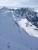 Romsdalshornet a Trollveggen počas výstupu záverom horného snehového poľa
