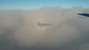 Počas klesania do Osla sa mi darí zvečniť aj tento zaujímavý úkaz v podobe vidma, v ktorého centre je tieň nášho lietadla
